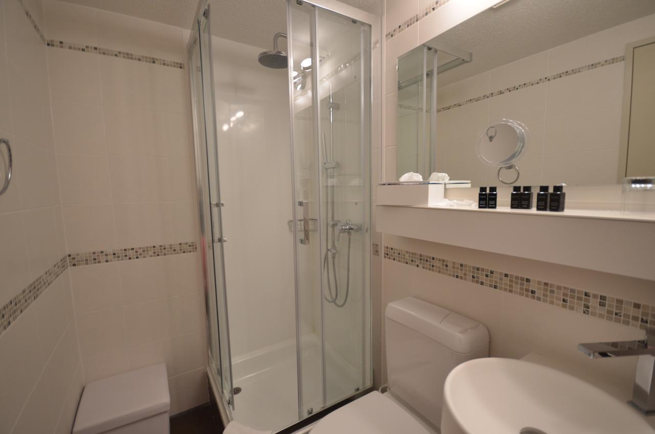 Boutique Hotel Riviera Spiez Ruang foto
